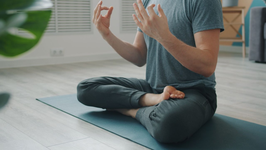 man doing yoga